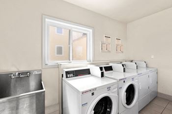 Laundry Room at Gloria Homes Apartments, Los Angeles